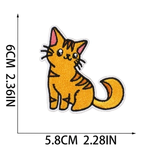 Detailed view of orange cat embroidery patch with height and width measurements