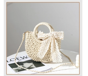 Detailed macro view of woven straw bag texture with elegant white lace bow decoration
