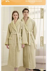 Detail view of long beige coral fleece bathrobe with plush trim and soft waist belt