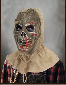 Macro detail of scary burlap scarecrow skull mask with realistic red blood stains and rope