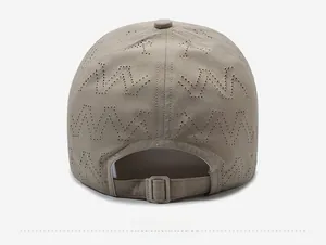 Detail view of khaki quick-dry baseball cap featuring breathable laser-cut wave patterns