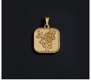 Detailed view of square 18K gold-plated pendant with intricate rose flower relief