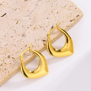 Minimalist 18K gold plated stainless steel oval egg-shaped earrings on stone