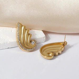Gold-plated wing-shaped stainless steel earrings with sparkling white crystals