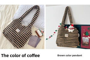 Detail of plush tote bag showing brown striped texture and cute dog pendant accessory
