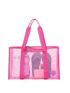 Pink minimalist mesh beach tote bag showing large capacity storage with summer essentials