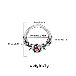 Detail view of silver septum ring with rose design and ruby stone, showing 10mm inner diameter