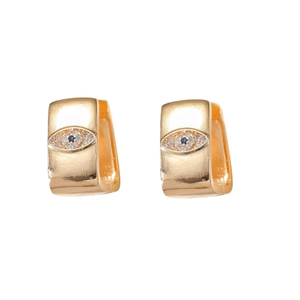 Detailed macro view of gold geometric hoop earrings featuring a zircon evil eye motif
