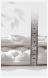 Detailed close-up of 5cm thick high-density memory foam bath mat with soft plush texture