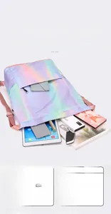 Top-down view of a gradient drawstring bag showing large storage capacity for travel items