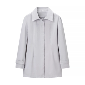 Detailed view of women's gray blazer set featuring lapels and a clean buttonless design