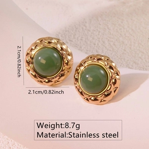 Detailed view of vintage gold stainless steel stud earrings with green resin stone