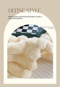 Detail of soft cream faux fur blanket with plush texture and elegant arched design frame
