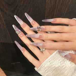 Purple gradient almond press-on nails with rhinestone accents and pearl finish