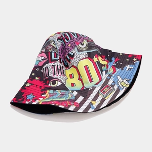 Detail showing retro 80s pop art style print on a versatile reversible bucket hat
