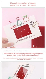 Creative star and reindeer shaped paper clips shown on a notebook for stationery decor