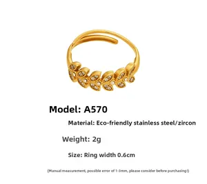 Detailed view of adjustable 18k gold plated stainless steel leaf ring with zircon accents