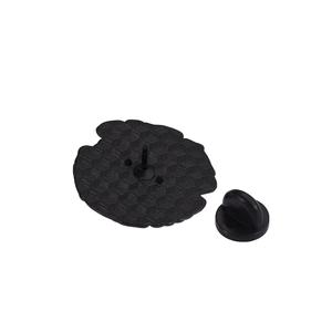 Enamel pin back view with textured black metal and durable rubber clutch closure