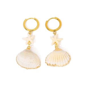 Golden hoop earrings featuring white starfish and gold-edged shell charms on white background