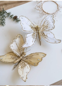 Detail of glitter fabric butterfly clips with sequins and gems for Christmas tree decor