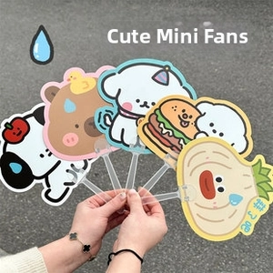 Close-up of five cute cartoon hand fans featuring cat and dog motifs with clear handles
