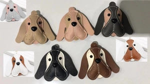 Detailed view showing stitching on handmade PU leather beagle dog charm keychains