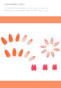 Détails de faux ongles amande avec motifs de cœurs et designs French tips oranges