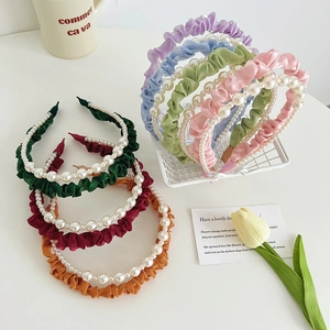 Selection of pleated fabric headbands with pearls in seven colors for various styles