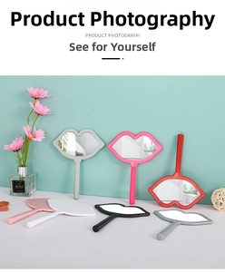 Handheld lip-shaped vanity mirrors in various colors displayed on a clean countertop