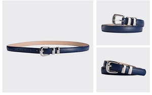 Detail view of a blue leather belt for women with a simple silver metal buckle