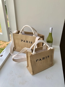 Straw woven tote bag set with white straps and Paris embroidery for beach vacation