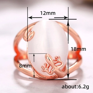 Rose gold lizard ring with white oval opal gemstone and dimensions displayed