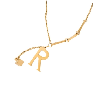 Minimalist gold titanium necklace featuring letter R pendant and small geometric square charm