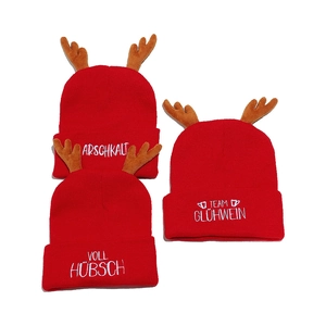 Christmas red knitted beanies with reindeer antlers and festive German embroidery