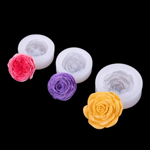 Detailed silicone molds for crafting realistic rose flowers in pink, purple, and yellow