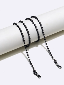 Detail of black pearl glasses chain with silicone loops and metal lobster clasps