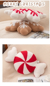 Close-up of festive snowflake and candy-shaped plush pillows on a cozy sofa