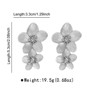 Silver flower earrings with brushed metal finish showing size dimensions and weight