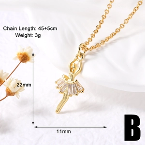 Macro detail of gold ballerina pendant necklace with sparkling clear baguette zircon stones