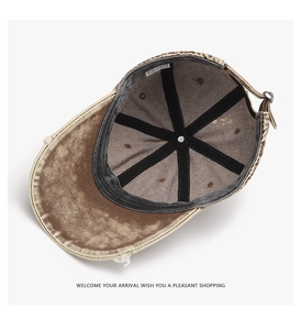 Macro view of distressed cotton baseball cap interior with stitching and wash label