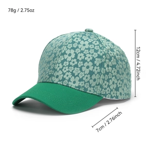 Floral baseball cap with green floral print and solid brim, showing dimensions and weight