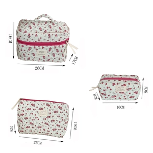 Three-piece floral corduroy cosmetic bag set with dimensions for travel organization