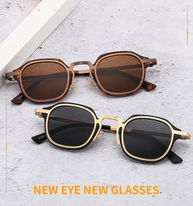 Detail of square vintage sunglasses showing tortoise texture and metal frame with model 61060