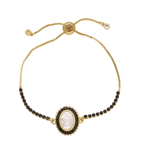 Adjustable gold-plated Virgin Mary bracelet with black stones and shell inlay