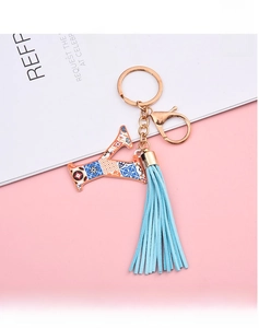 Detail of letter Y alphabet keychain with blue tassel and gold lobster clasp