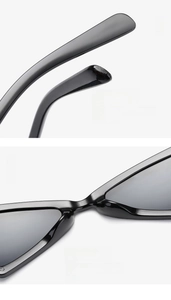 Macro detail of glossy black resin temples and integrated nose pads on cat eye sunglasses