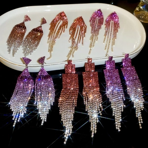Detailed view of geometric rhinestone tassel earrings in multiple gradient colors