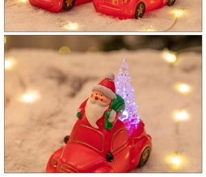 Detail of Santa Claus in red car with glowing Christmas tree on snow background