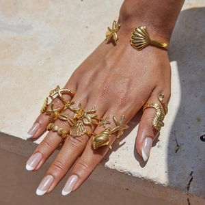 18K gold plated ocean theme jewelry set featuring starfish and seashell rings for women