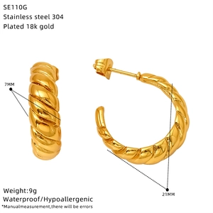 Detailed view of 21mm twisted gold hoop earrings showing size and texture specifications